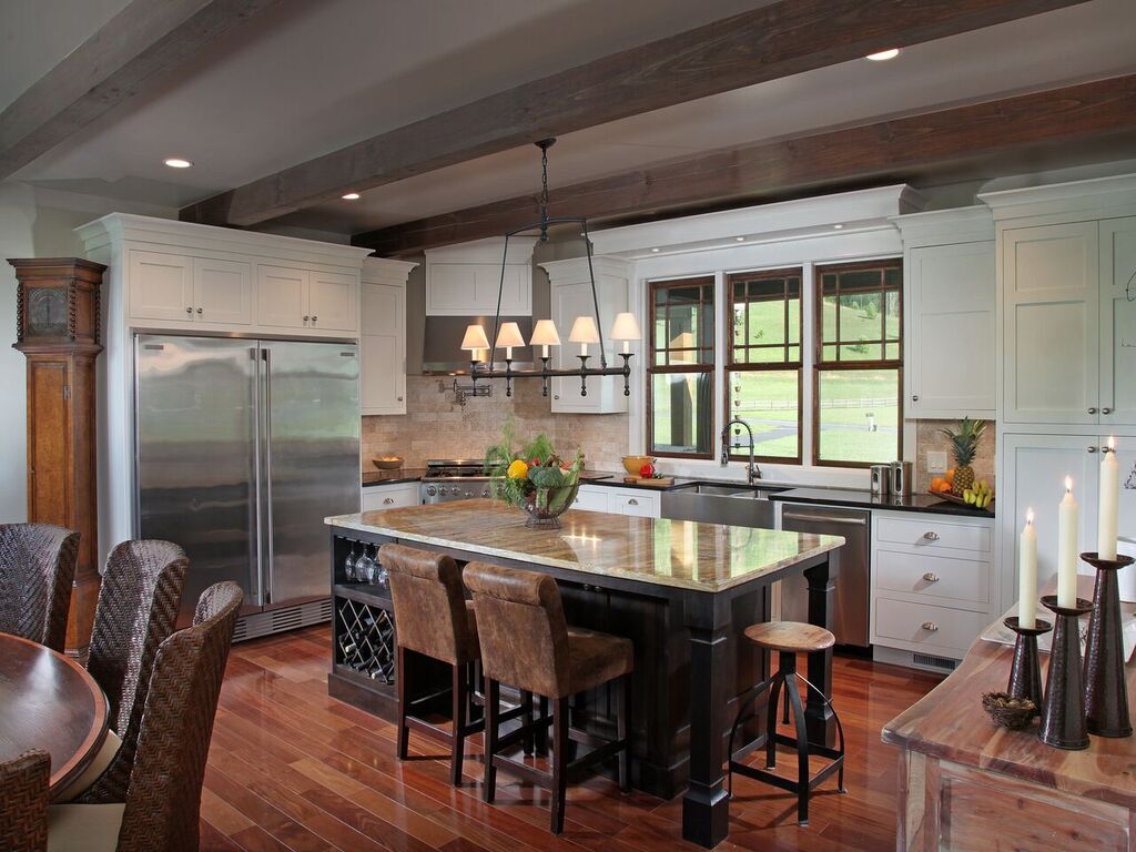 espresso-hued wood on island and quartz countertops