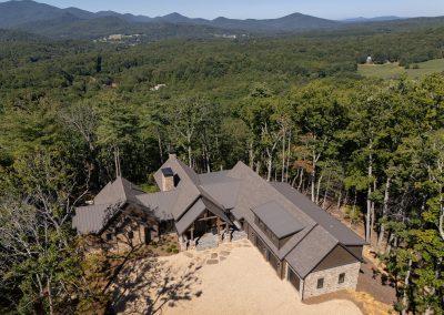 Custom Home The bird's eye view showcases the generous pea gravel motor court of this luxury home in Blairsville Georgia.
