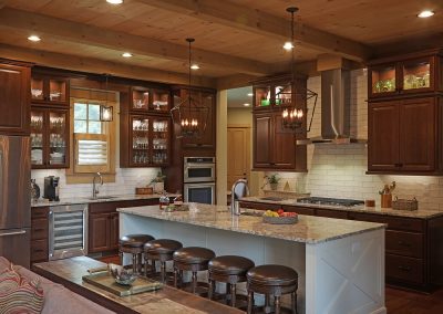 The gourmet kitchen welcomes conversation.