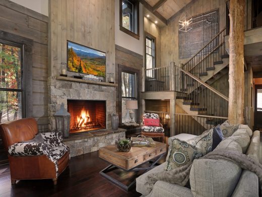 Modern rustic interior living room with vertical wood planks and stone fireplace in Jasper, Georgia by Modern Rustic Homes